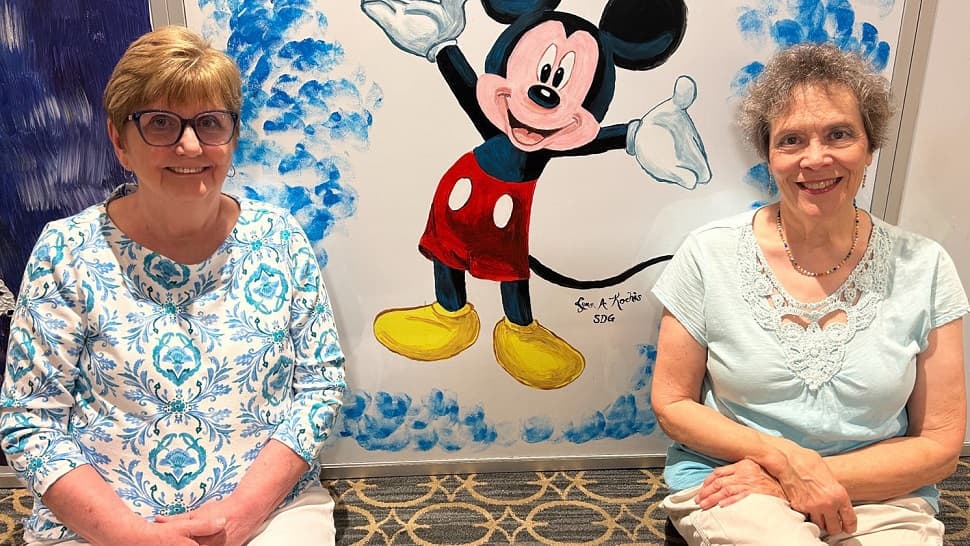 Charlestown Senior Artists Transform Construction Walls into Vibrant Community Gallery